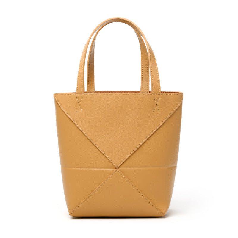 Large capacity single shoulder geometric splicing folding bucket bag
